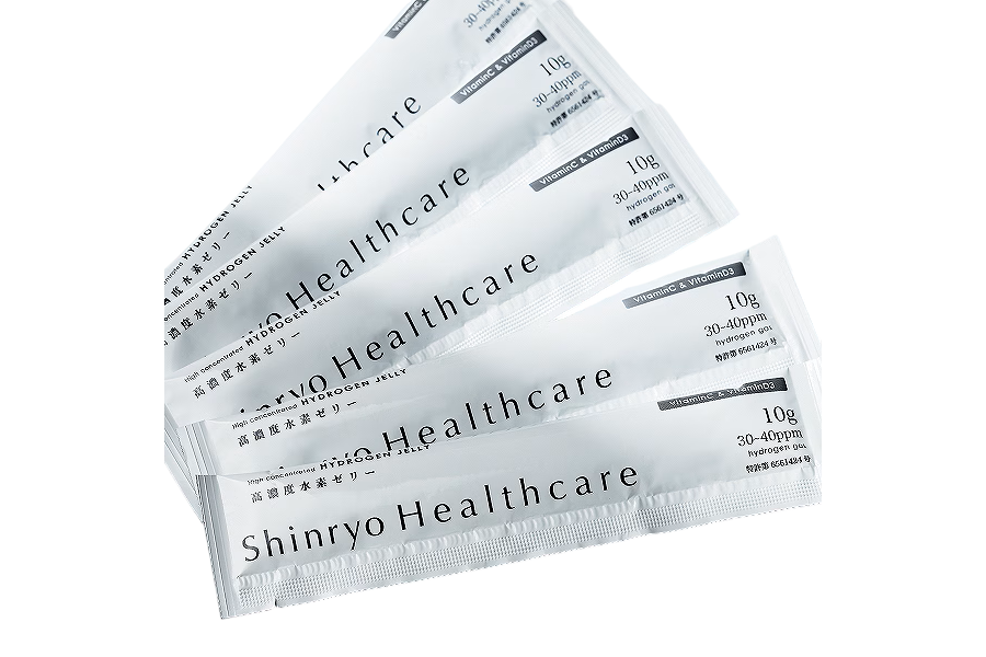 高濃度水素ゼリーVitaminC&Dの白いスティックパウチを重ねて並べたところ。