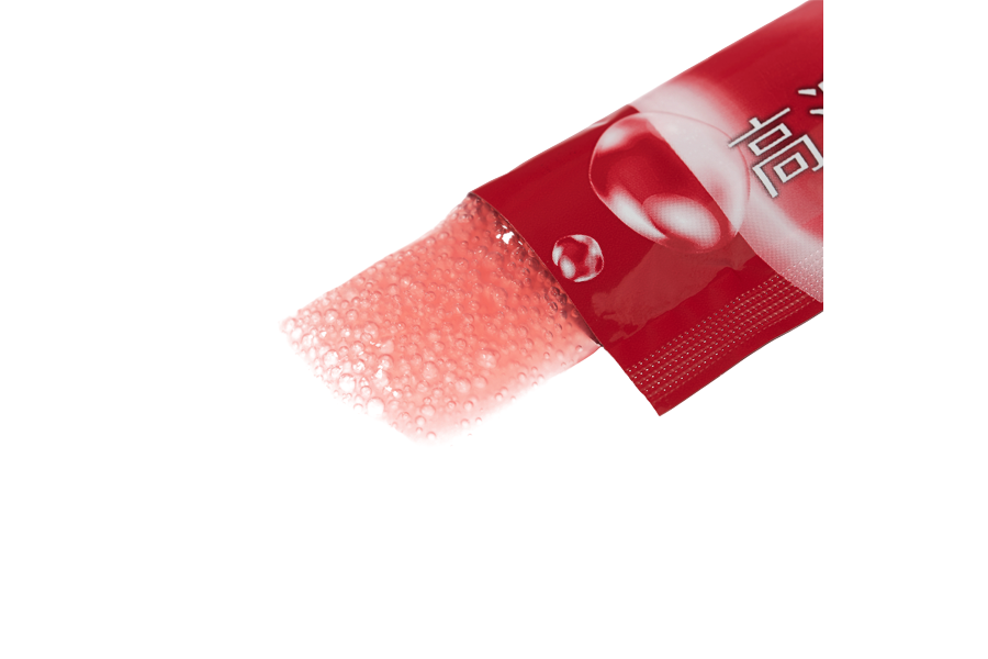 An opened stick of High-Concentration Hydrogen Jelly with bubbly pink jelly squeezed out.
